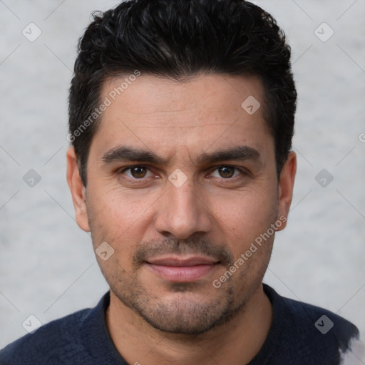 Joyful white young-adult male with short  black hair and brown eyes