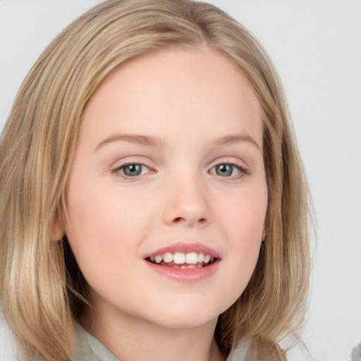 Joyful white child female with medium  brown hair and blue eyes