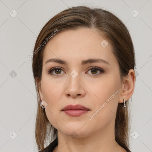 Neutral white young-adult female with long  brown hair and brown eyes