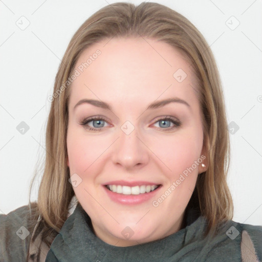 Joyful white young-adult female with long  brown hair and blue eyes