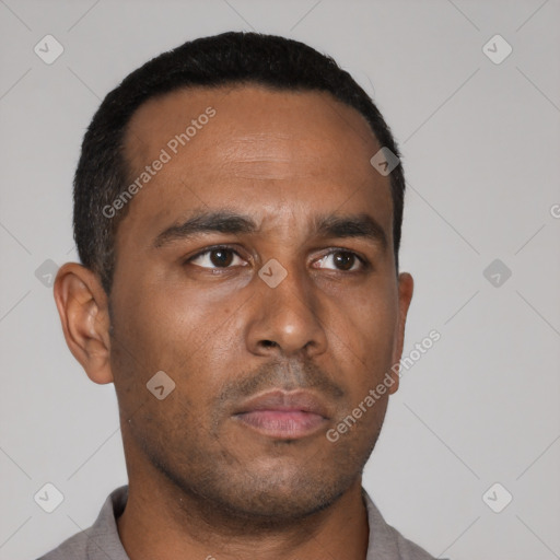 Neutral latino young-adult male with short  black hair and brown eyes