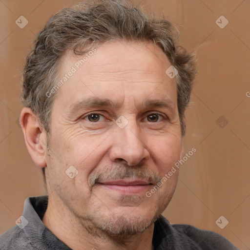 Joyful white middle-aged male with short  brown hair and brown eyes