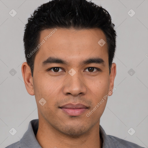 Joyful white young-adult male with short  black hair and brown eyes