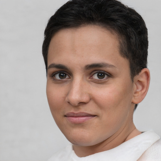 Joyful white young-adult female with short  brown hair and brown eyes