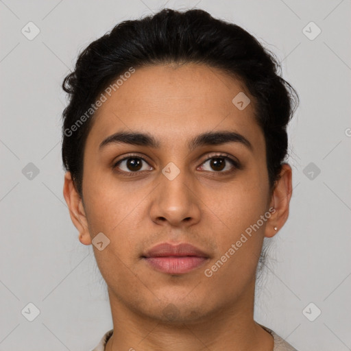 Neutral latino young-adult male with short  black hair and brown eyes