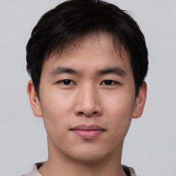 Neutral asian young-adult male with short  brown hair and brown eyes