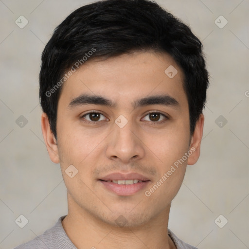 Joyful asian young-adult male with short  black hair and brown eyes