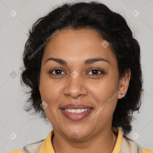 Joyful latino adult female with short  brown hair and brown eyes