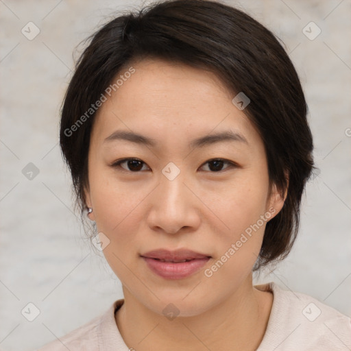 Joyful asian young-adult female with medium  brown hair and brown eyes