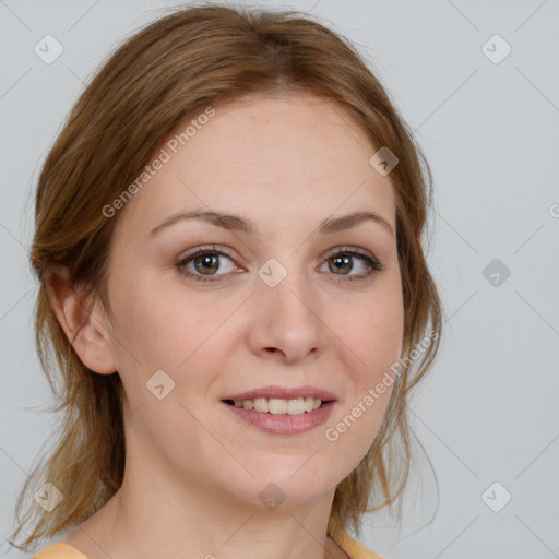 Joyful white young-adult female with medium  brown hair and blue eyes