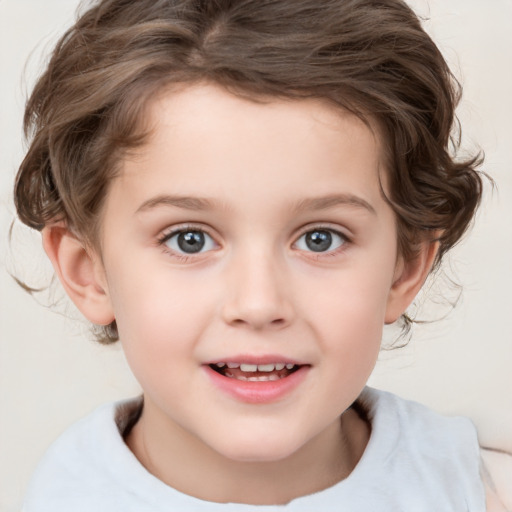 Joyful white child female with medium  brown hair and grey eyes