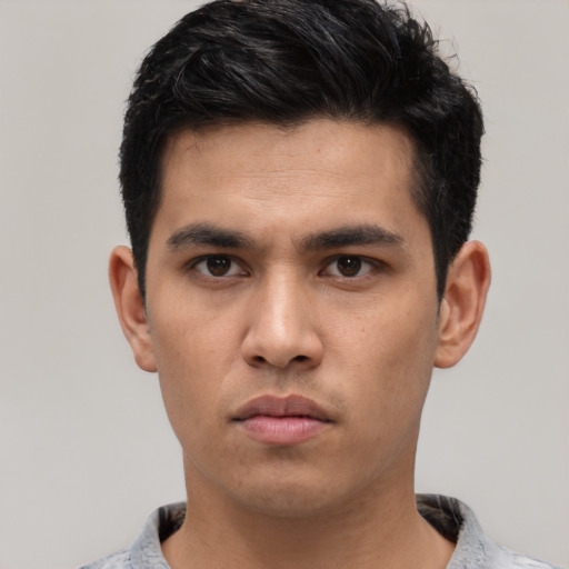 Neutral white young-adult male with short  black hair and brown eyes