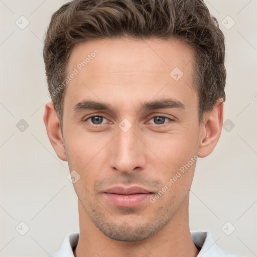 Neutral white young-adult male with short  brown hair and brown eyes