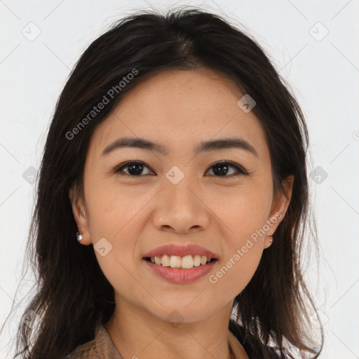 Joyful asian young-adult female with long  brown hair and brown eyes