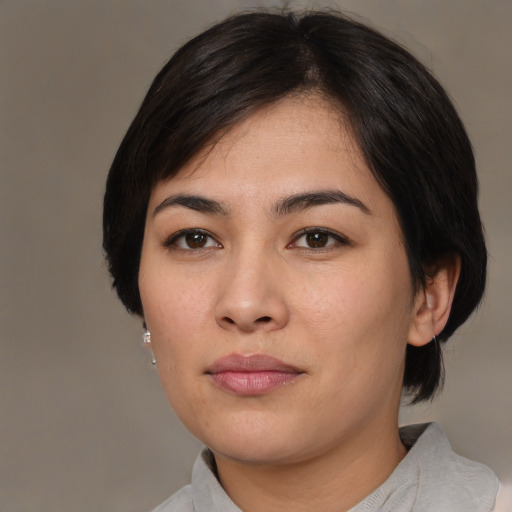 Neutral asian young-adult female with medium  black hair and brown eyes