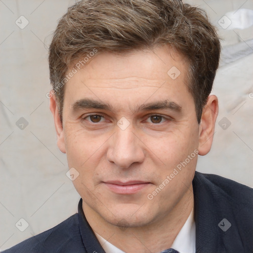 Joyful white adult male with short  brown hair and brown eyes