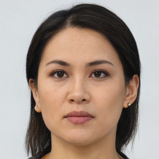 Neutral asian young-adult female with medium  brown hair and brown eyes