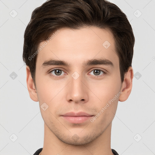 Neutral white young-adult male with short  brown hair and brown eyes