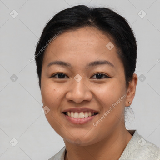 Joyful asian young-adult female with short  brown hair and brown eyes