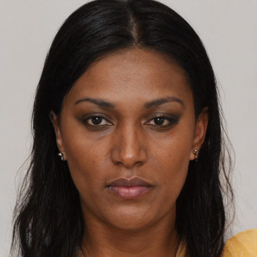 Neutral black young-adult female with long  black hair and brown eyes