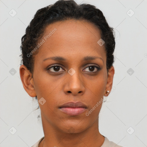 Neutral black young-adult female with short  brown hair and brown eyes