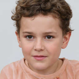 Joyful white child male with short  brown hair and brown eyes