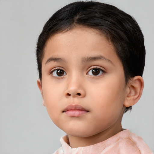 Neutral white child female with short  brown hair and brown eyes