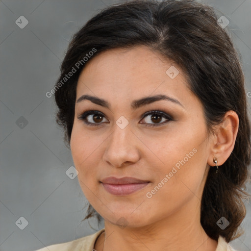 Joyful latino young-adult female with medium  brown hair and brown eyes