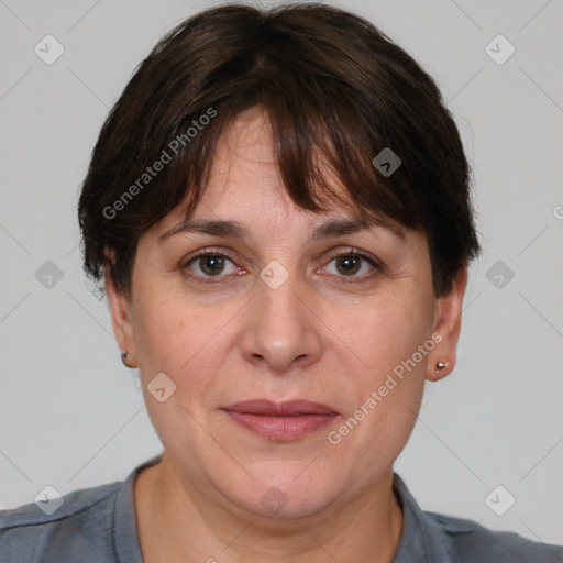 Joyful white adult female with short  brown hair and brown eyes