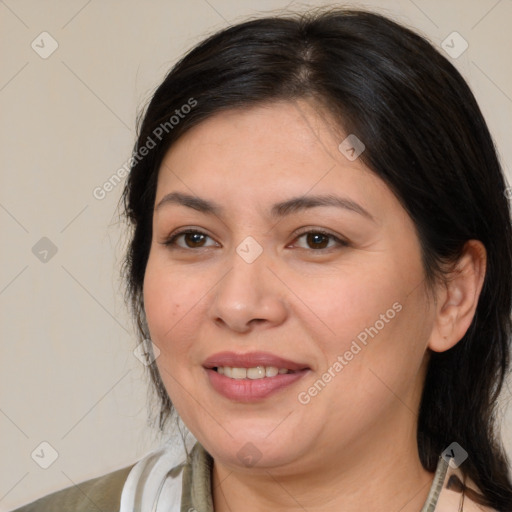 Joyful white adult female with medium  brown hair and brown eyes