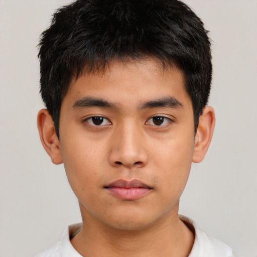 Neutral asian child male with short  brown hair and brown eyes
