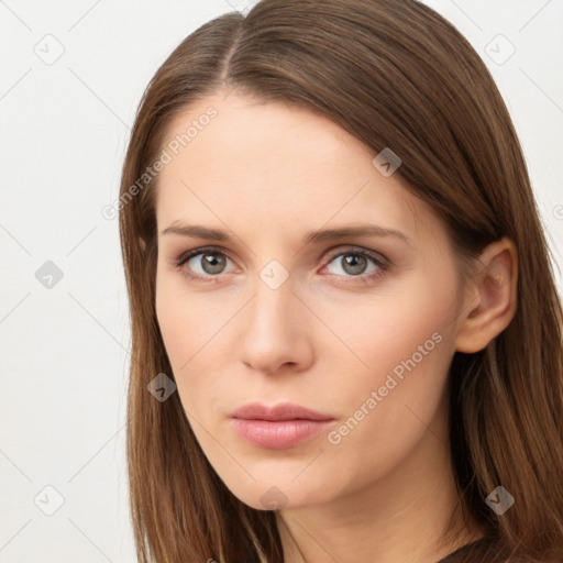 Neutral white young-adult female with long  brown hair and brown eyes