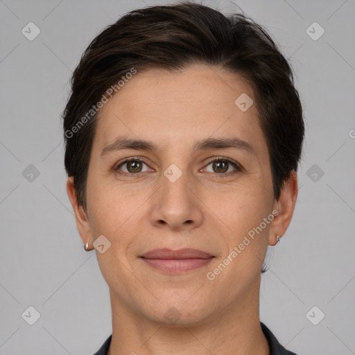 Joyful white young-adult female with short  brown hair and brown eyes