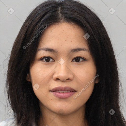 Joyful asian young-adult female with long  brown hair and brown eyes