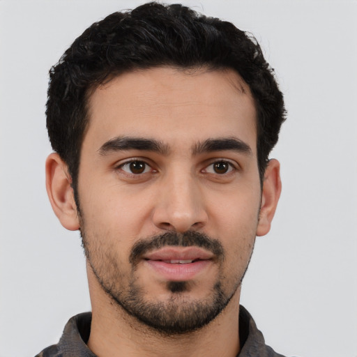 Neutral white young-adult male with short  black hair and brown eyes