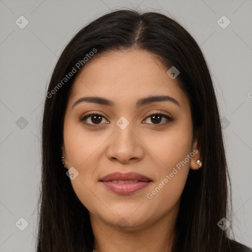 Joyful latino young-adult female with long  brown hair and brown eyes