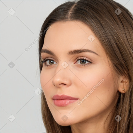 Neutral white young-adult female with long  brown hair and brown eyes