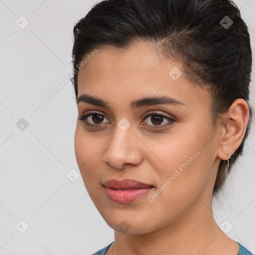 Joyful latino young-adult female with medium  brown hair and brown eyes