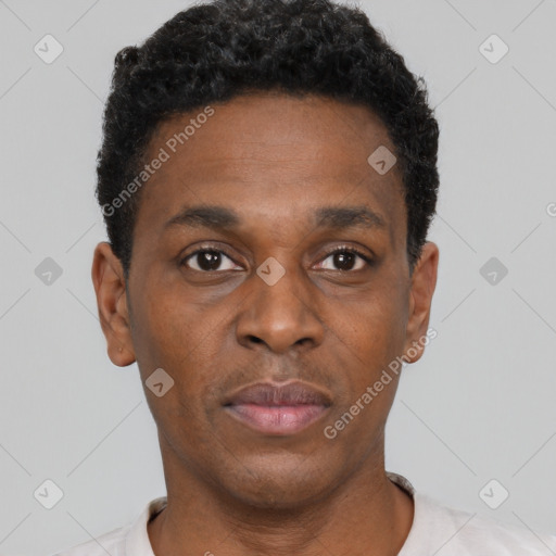 Neutral black young-adult male with short  black hair and brown eyes