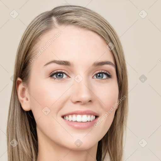 Joyful white young-adult female with long  brown hair and blue eyes