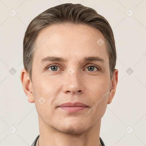 Joyful white adult male with short  brown hair and brown eyes