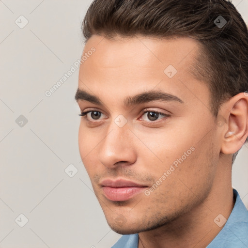 Neutral white young-adult male with short  brown hair and brown eyes