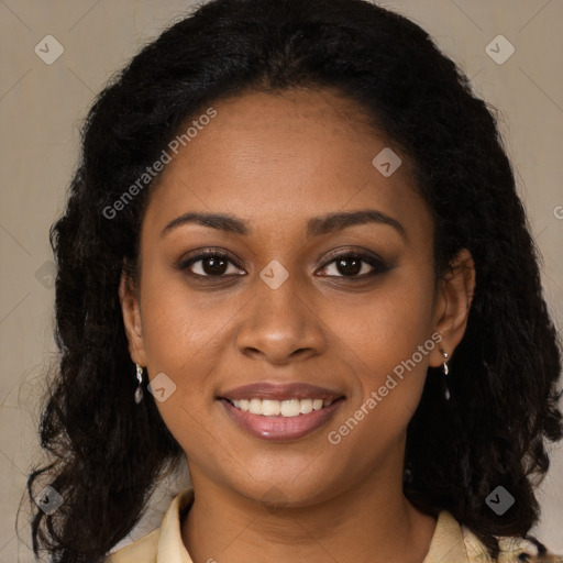 Joyful black young-adult female with long  brown hair and brown eyes