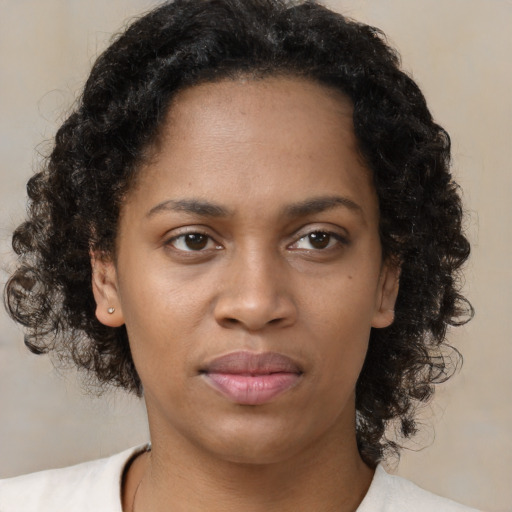Neutral latino young-adult female with short  brown hair and brown eyes