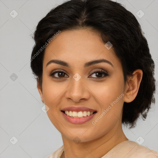 Joyful latino young-adult female with long  brown hair and brown eyes