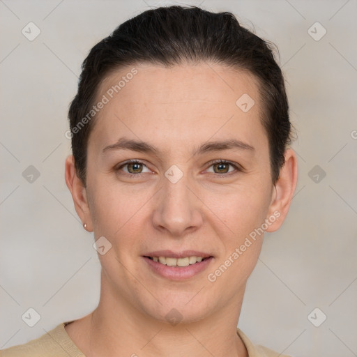 Joyful white young-adult female with short  brown hair and grey eyes