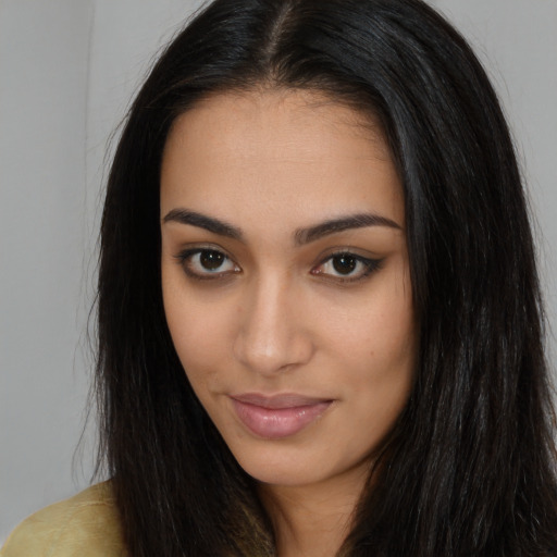 Neutral latino young-adult female with long  brown hair and brown eyes