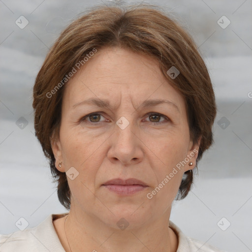 Joyful white adult female with short  brown hair and grey eyes