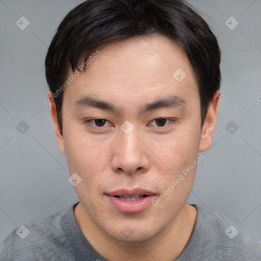 Neutral asian young-adult male with short  brown hair and brown eyes