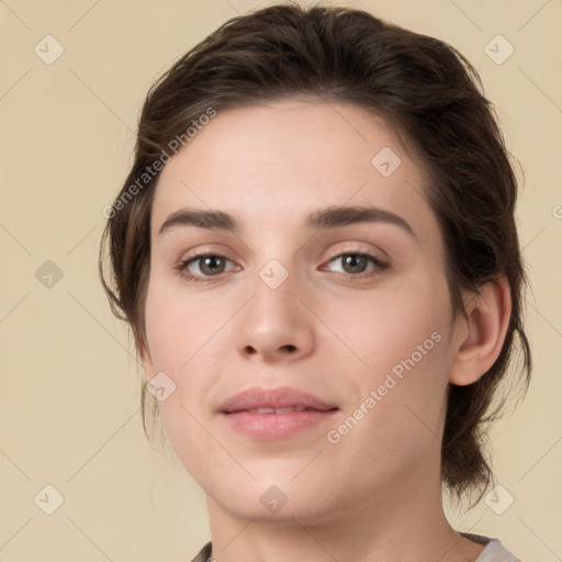 Neutral white young-adult female with medium  brown hair and brown eyes